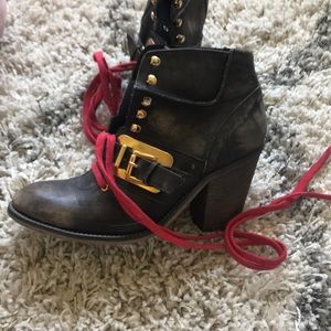 Free people distressed bootie with red laces